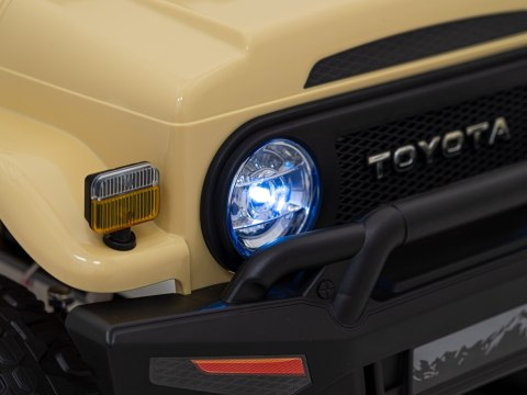 Toyota FJ Cruiser dla dzieci Beżowy + Pilot + Napęd 4x4 + Audio LED + EVA + Wolny Start Toyota FJ Cruiser dla dzieci Beżowy + Pilot + Napęd 4x4 + Audio LED + EVA + Wolny Start